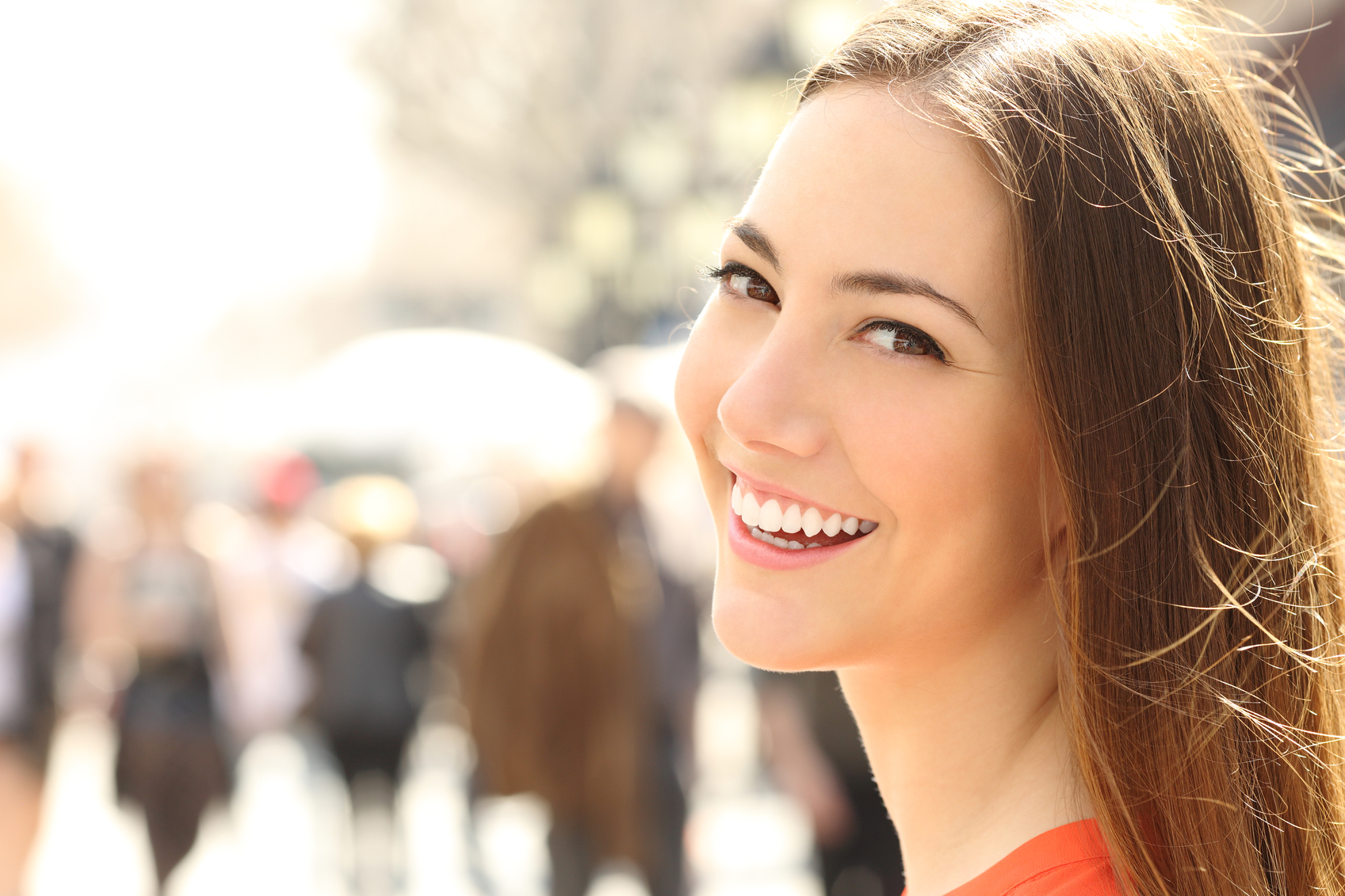 Young woman smiling with perfect dental health