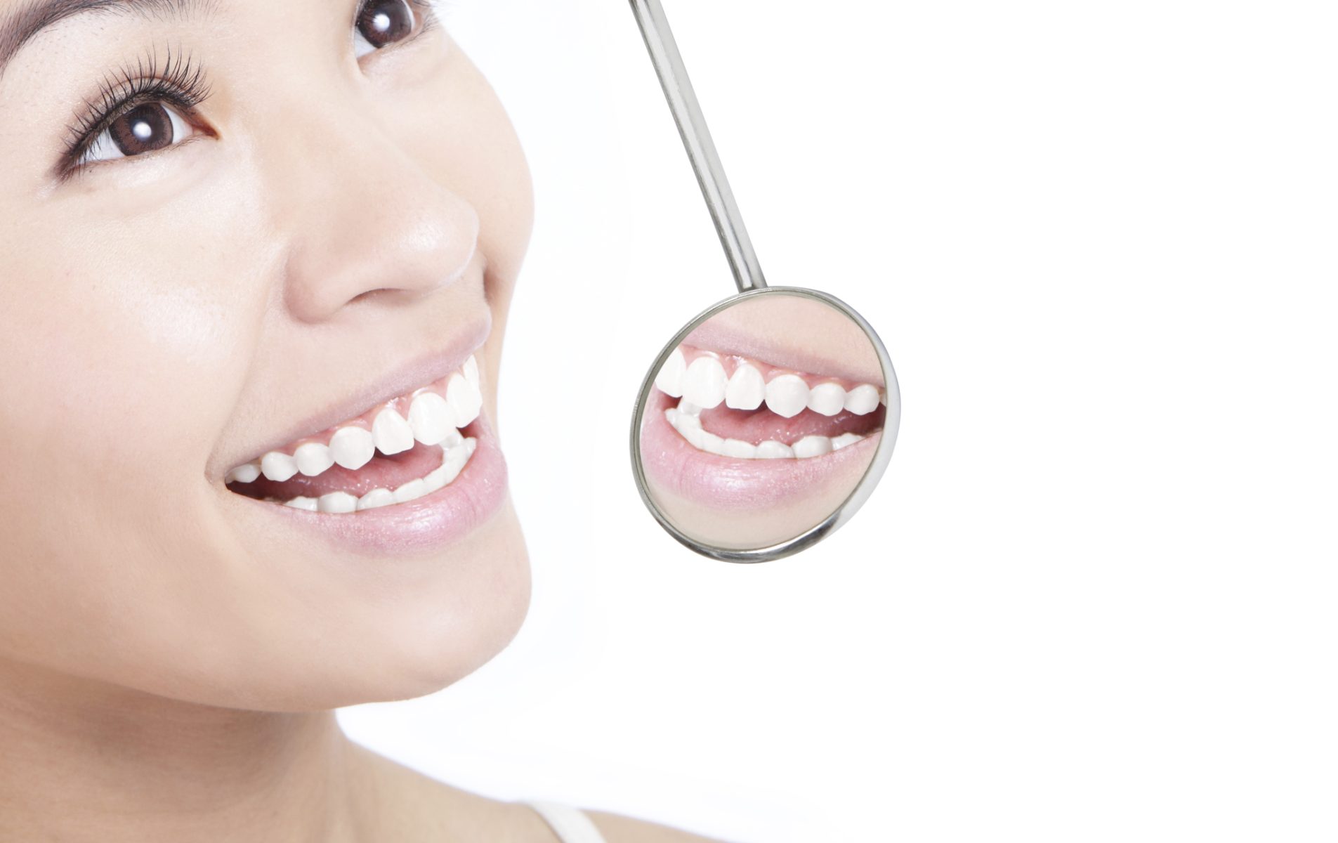 Young woman smiling with perfect dental health